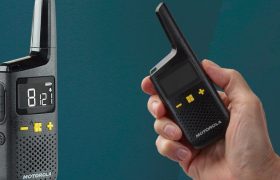 XT185 with Hand Holding Radio Studio3_Edit_Lifestyle